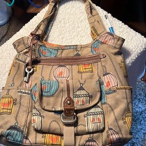 Fossil bird cage purse